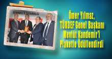 Ömer Yılmaz, TÜRDEF Genel Başkanı Mevlüt Kandemir'i Plaketle Ödüllendirdi 